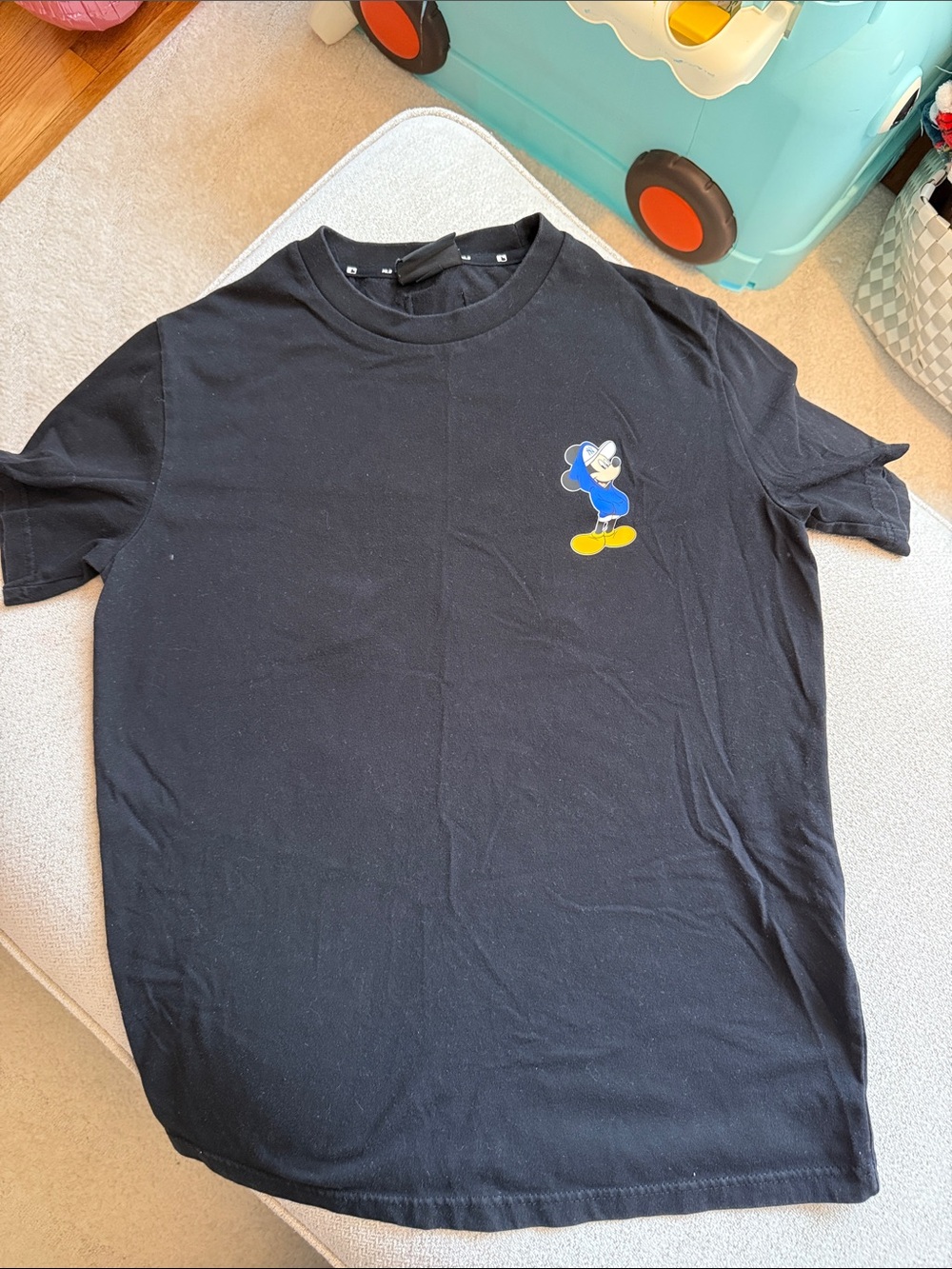 MLB Black Tee with Small Blue Character and Yellow Accent
